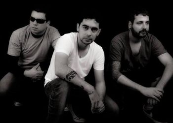 Banda é formada por Gustavo Voz (baixo e Voz), Sérgio Seddi (guitarras) e Chocolate (bateria e vocais)