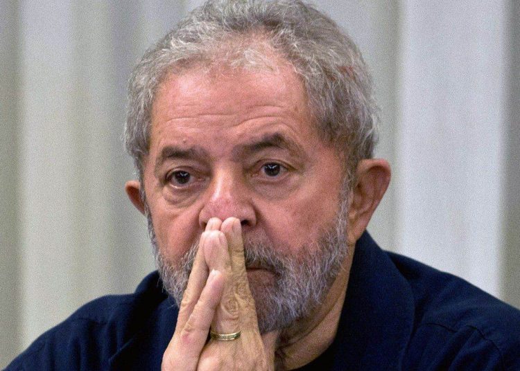 Former Brazilian President (2003-2011) Luiz Inacio Lula da Silva gestures during a meeting with the Workers' Party (PT) members in Sao Paulo, Brazil on March 30, 2015 AFP PHOTO / Nelson ALMEIDA        (Photo credit should read NELSON ALMEIDA/AFP/Getty Images)