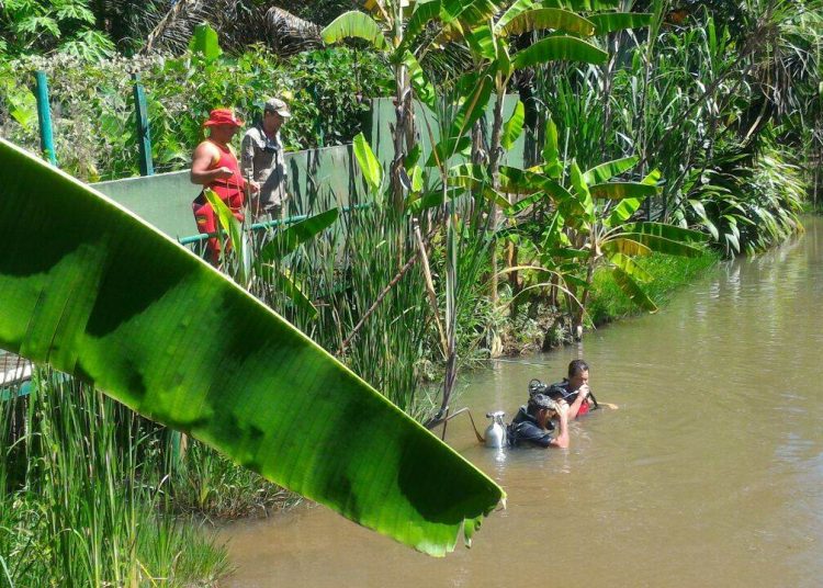 Corpo do rapaz foi encontrado dentro de uma represa em uma chácara particular em Goiânia| Foto: Reprodução/Corpo de Bombeiros
